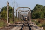 L572 rolls along under through the tunnel of arches as it approaches Penford